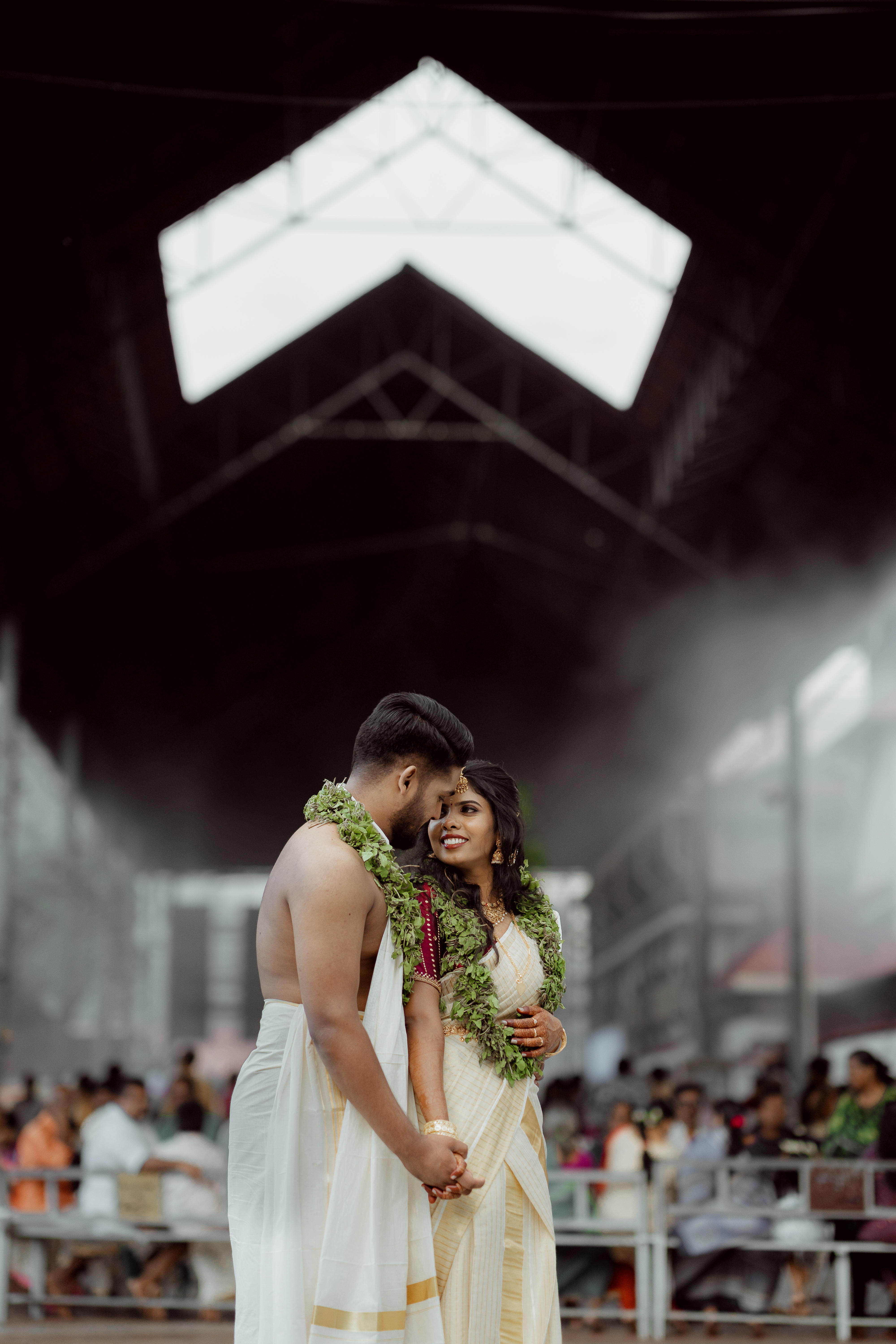 Emotional candid wedding photography moment in Mangalore